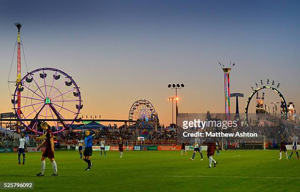 The sun sets with the California State Fair as a back drop to the match