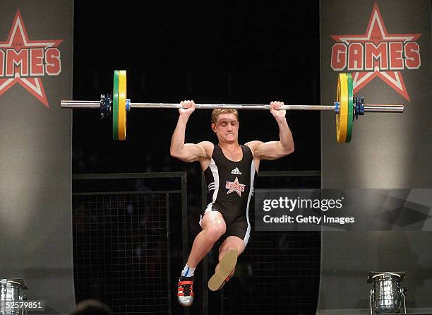 Philip Olivier competes in the weightlifting event at "The Games: Champion of Champions" final contest at the Don Valley Stadium on April 2, 2005 in...