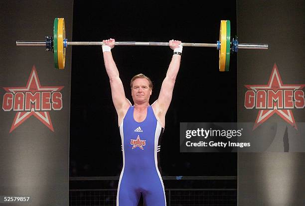 James Hewitt competes in the weightlifting event at "The Games: Champion of Champions" final contest at the Don Valley Stadium on April 2, 2005 in...