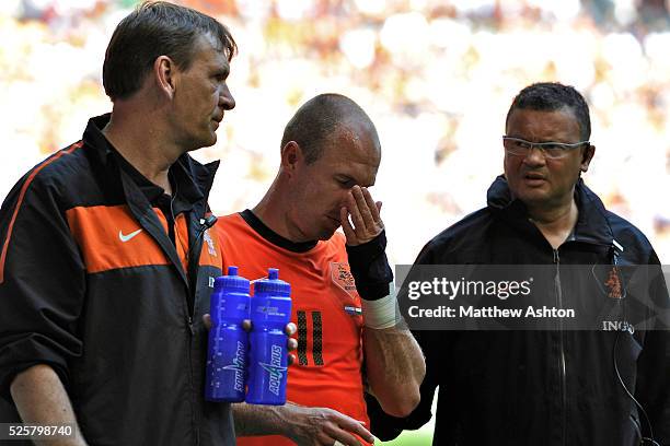 Arjen Robben of the Netherlands leaves the game with an injury and is a doubt for the FIFA 2010 World Cup