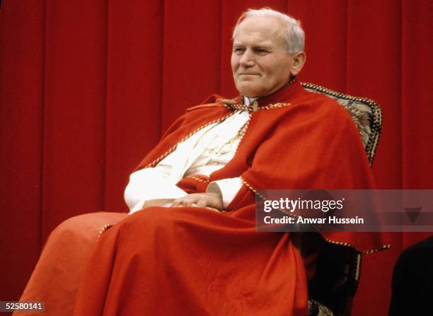 Pope John Paul II sits during to his visit to France in May 1980 in Paris, France.