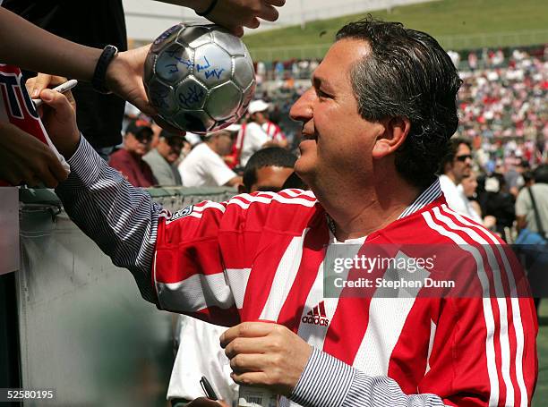 Owner Jorge Vergara of Chivas USA signs autographs before their inaugural Major League Soccer match with DC United on April 2, 2005 at the Home Depot...