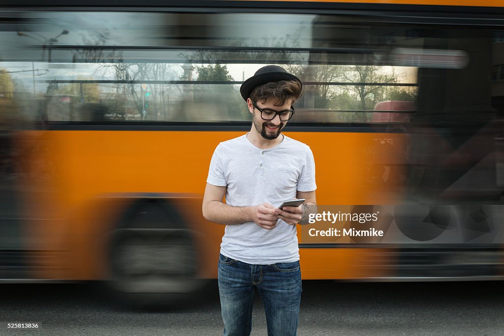 Teenager texting on cell phone