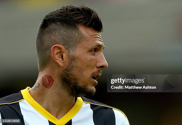 Cyril Thereau of Udinese with a tattoo of some lips on his neck