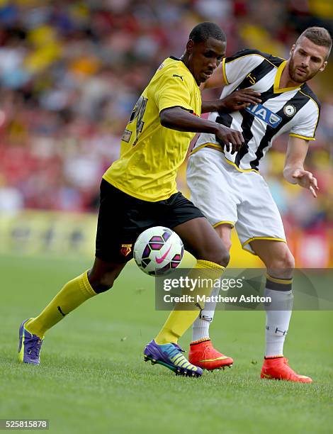 Odion Ighalo of Watford and Thomas Heurtaux of Udinese