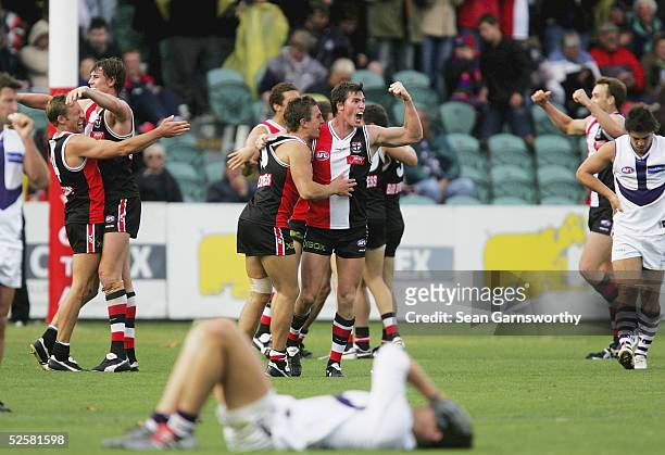 St Kilda players celebrate winning the AFL round 2 match between the St Kilda Saints and Fremantle Dockers by 1 point at the Aurora Stadium April 3,...
