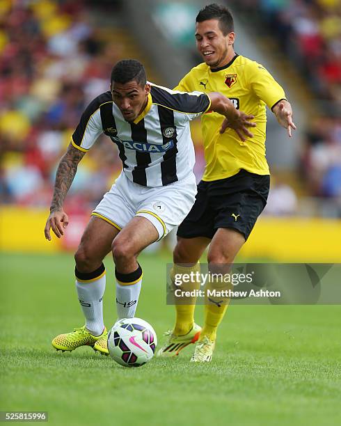 Allan Marques Loureiro of Udinese and Cristian Battocchio of Watford