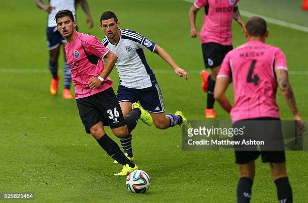 Graham Dorrans of West Bromwich Albion and Ruben Neves of FC Porto