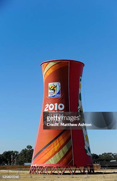 Cooling tower next to Soccer City with a 2010 FIFA World Cup South Africa logo on it