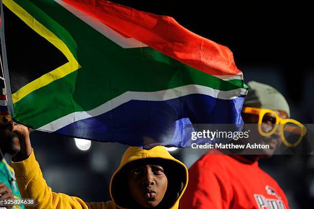 Fan from South Africa waves a flag