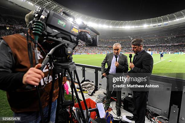 Jim Rosenthal and Andy Townsend present the ITV Sport World Cup show from pitchside
