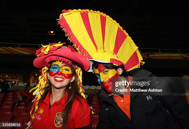 Spain fans with painted faces