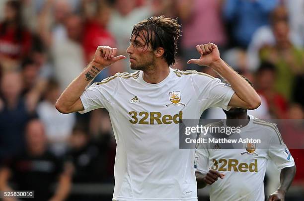 Miguel Michu of Swansea City celebrates after scoring to make it 2-2