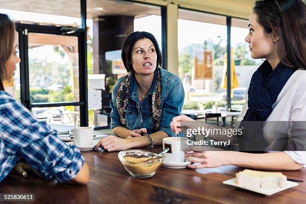 Small Discussing 11,483 Small Group Discussion Serious Stock Photos, High-Res Pictures ...