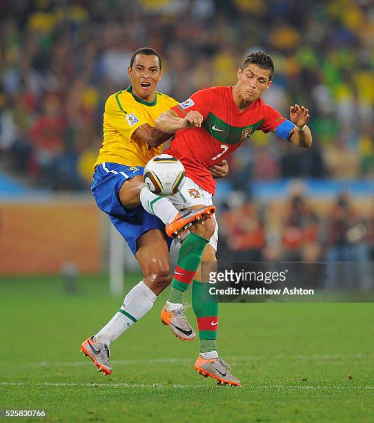 Gilberto Silva of Brazil and Cristiano Ronaldo of Portugal