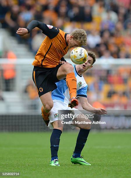 George Saville of Wolverhampton Wanderers and Tom Cairney of Blackburn Rovers