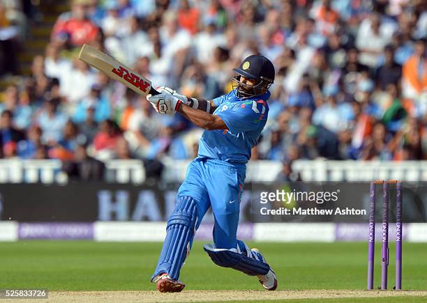 Shikhar Dhawan of India hits six runs