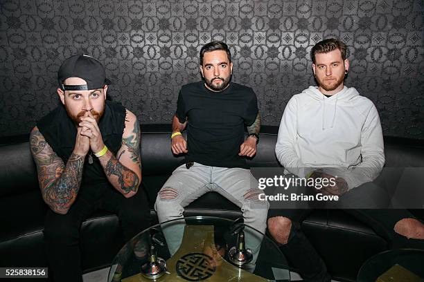 Kevin Skaff, Jeremy McKinnon, and Neil Westfall attend the Blink 182-Karaoke Summer Tour Announcement at the Blind Dragon on April 28, 2016 in West...