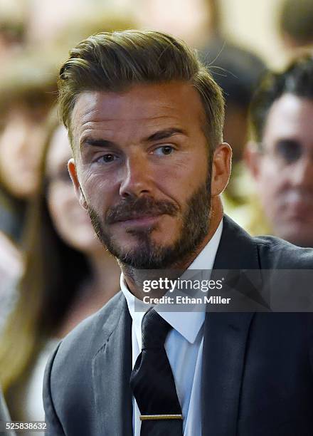 Former soccer player David Beckham looks on during a Southern Nevada Tourism Infrastructure Committee meeting with Oakland Raiders owner Mark Davis...