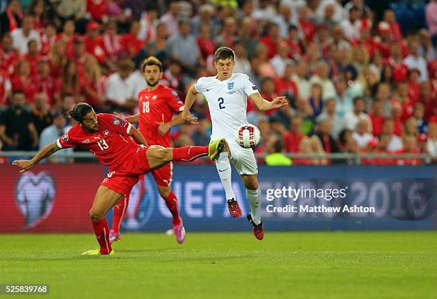 Ricardo Rodriguez of Switzerland and John Stones of England