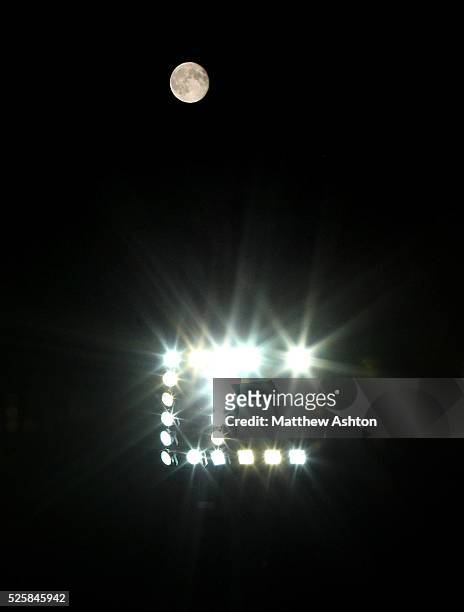Full moon above the floodlight at Loftus Road Stadium, home of Queens Park Rangers