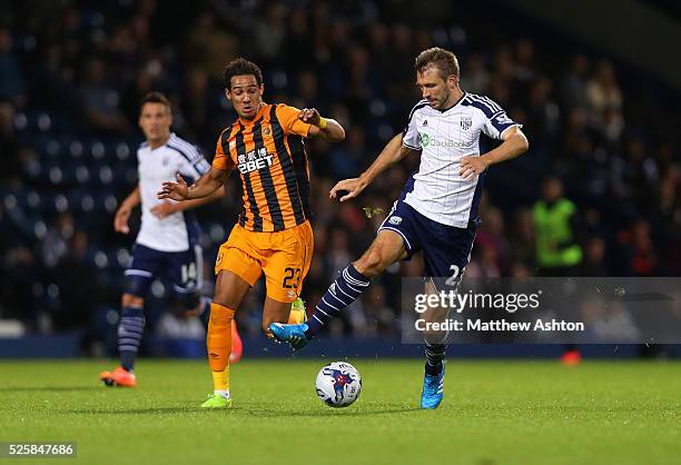 Thomas Ince of Hull City and Gareth McAuley of West Bromwich Albion