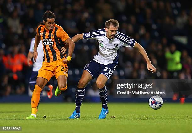 Thomas Ince of Hull City and Gareth McAuley of West Bromwich Albion