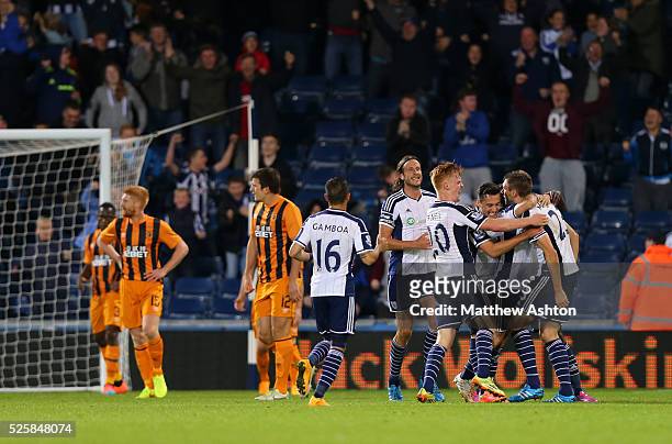 Gareth McAuley of West Bromwich Albion celebrates after scoring a goal to make it 2-2
