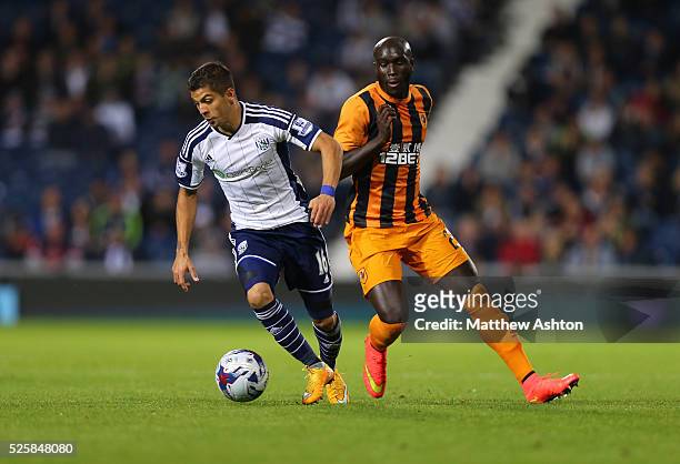 Cristian Gamboa of West Bromwich Albion and Yannick Sagbo of Hull City