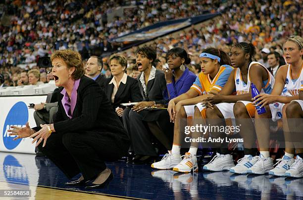 Head coach Pat Summitt, Assistant coaches Dean Lockwood, Holly Warlick and Nikki Caldwell of the Tennessee Lady Vols react to a play in the Semifinal...