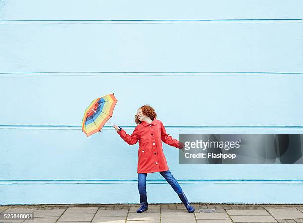 Girl dancing with umbrella