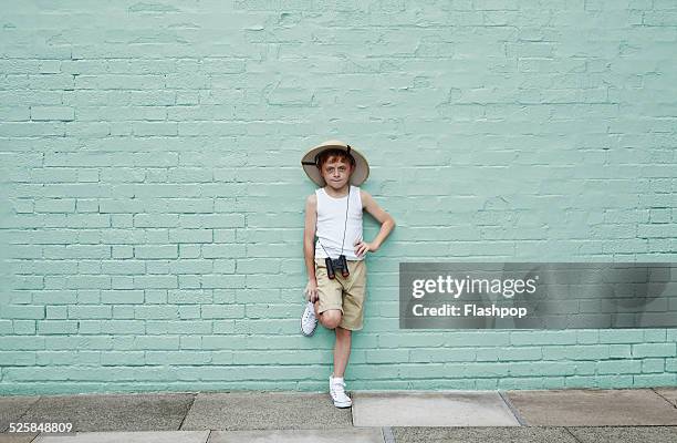 boy dressed as an adventurer with binoculars - kid leaning stock pictures, royalty-free photos & images