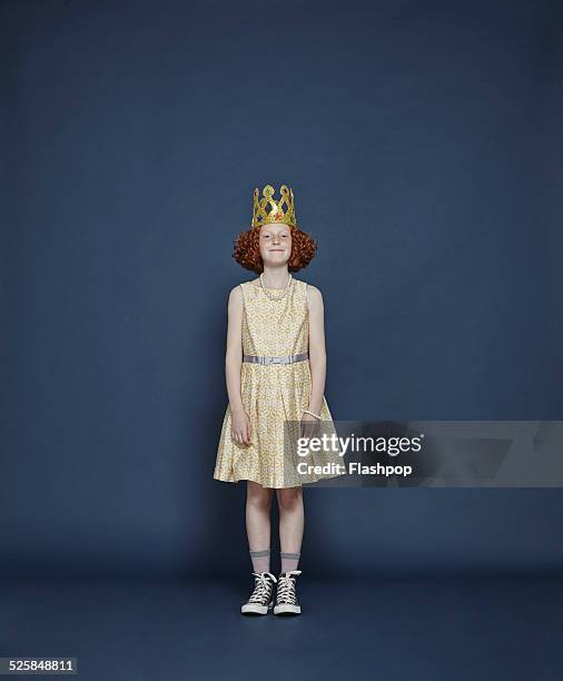 girl wearing a gold crown - girl in yellow dress stock pictures, royalty-free photos & images