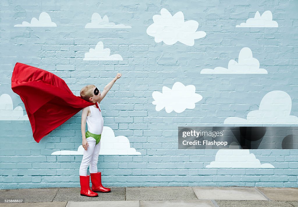 Boy dressed as a superhero