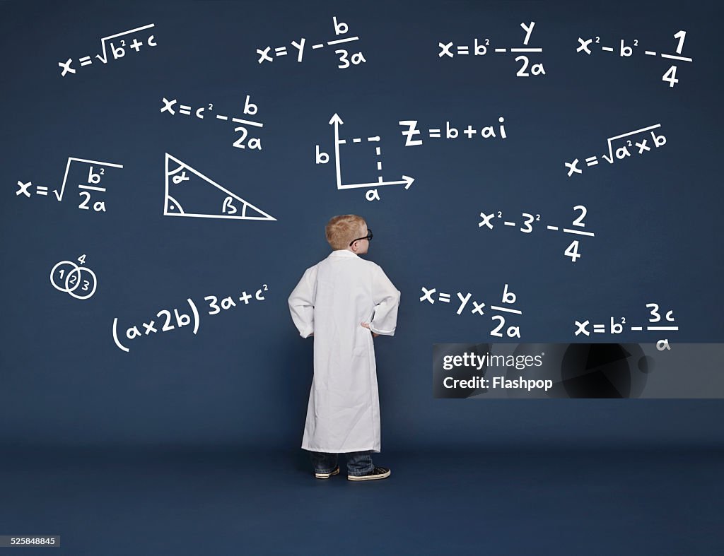 Boy with mathematical equations