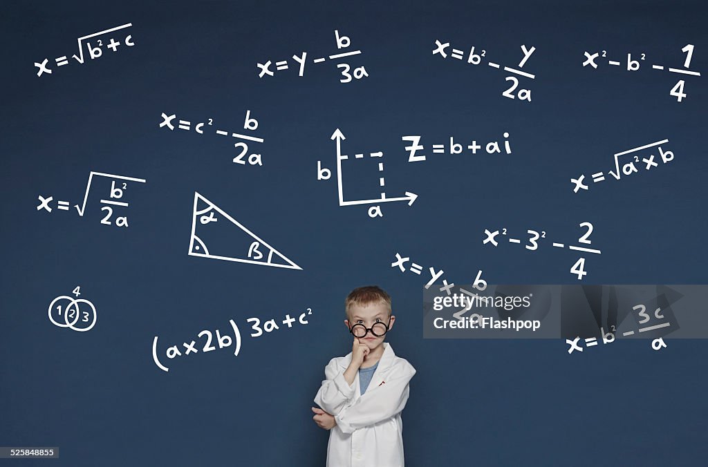 Boy with mathematical equations