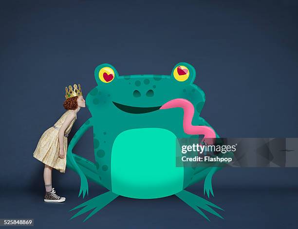 girl kissing lovestruck cartoon frog - giant frog stock pictures, royalty-free photos & images