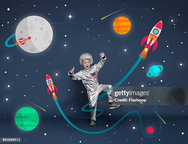 boy dressed as an astronaut. cartoon space scene - silver moon pictures stock pictures, royalty-free photos & images