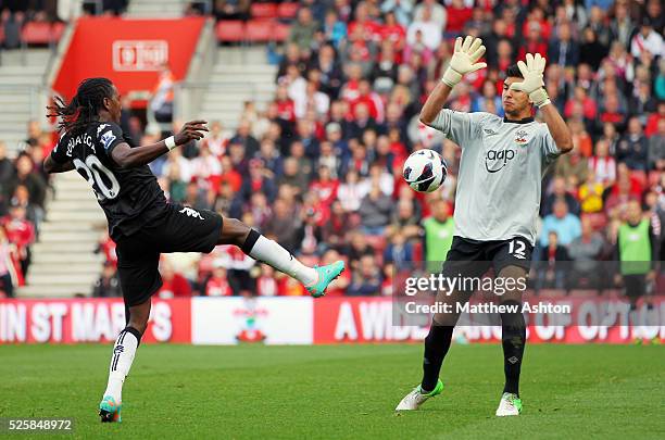 Hugo Rodallega of Fulham sees his shot saved by goalkeeper Paulo Gazzaniga of Southampton