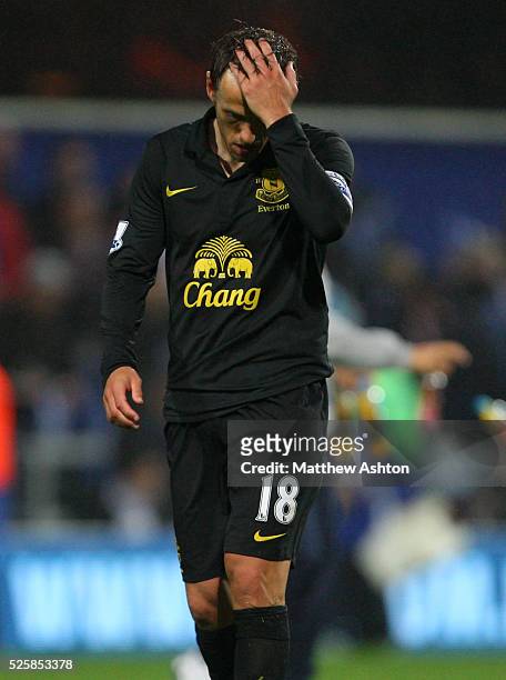 Dejected looking Phil Neville of Everton