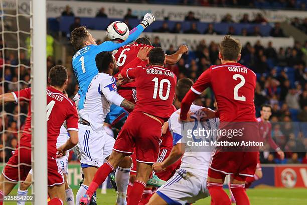 Wayne Hennessey of Wales fails to punch the ball clear which resulted in Vincent Laban of Cyprus from scoring to make it 2-1