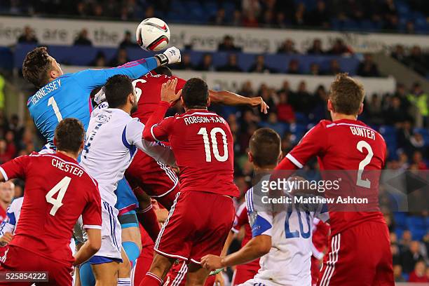 Wayne Hennessey of Wales fails to punch the ball clear which resulted in Vincent Laban of Cyprus from scoring to make it 2-1