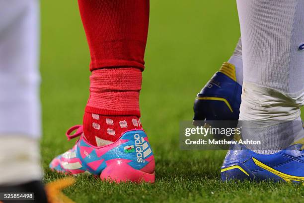 The boots of Gareth Bale of Wales with a Wales flag on them