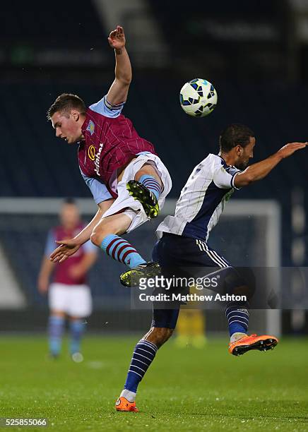 Kevin Toner of Aston Villa U21 and Kemar Roofe of West Bromwich Albion U21