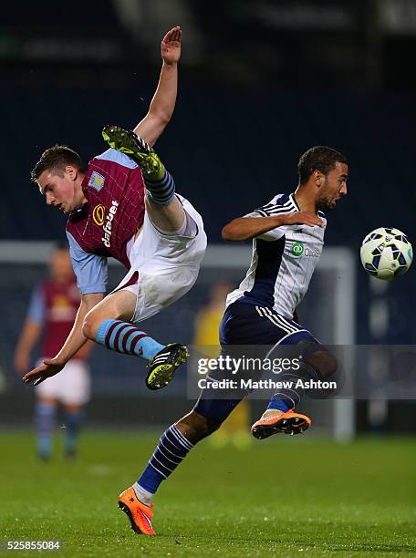 Kevin Toner of Aston Villa U21 and Kemar Roofe of West Bromwich Albion U21