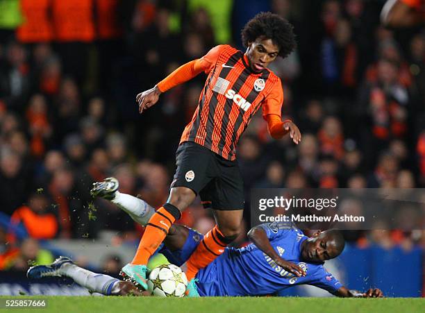 Ramires of Chelsea tackles Willian of Shakhtar Donetsk