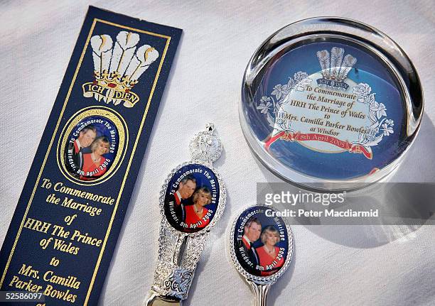 Souvenir book mark, letter opener, spoon and paper weight celebrating the marriage of Prince Charles and Camilla Parker-Bowles are displayed on March...