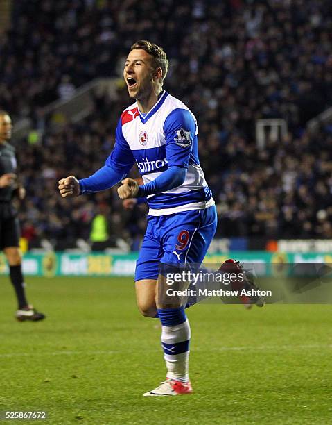 Adam Le Fondre of Reading celebrates after scoring a goal to make it 2-2