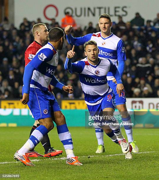 Adam Le Fondre of Reading celebrates after scoring a goal to make it 2-2