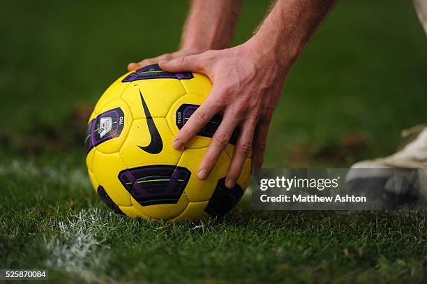 Chris Brunt of West Bromwich Albion places the official Nike match ball of the Barclays Premier League before taking a corner kick